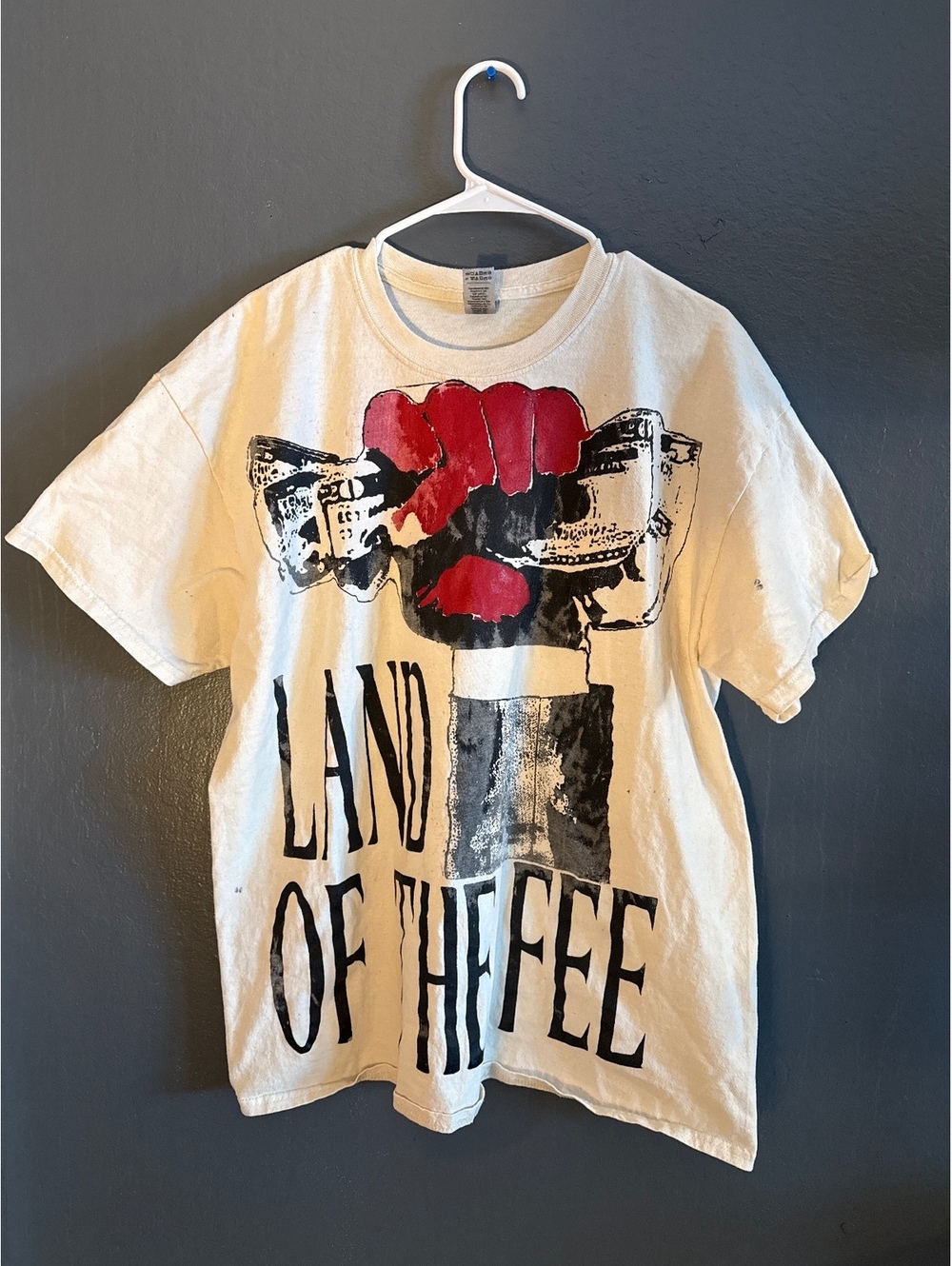 Vintage White Graphic T-Shirt with 'Land of the Fee' Print